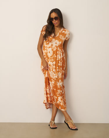 Women's Tiered Flowy Printed Maxi Dress in Floral Canvas Orange | Cable & Gauge Women's Tiered Flowy Printed Maxi Dress in Floral Canvas Orange | Cable & Gauge